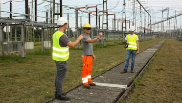 An employee tests the AR glasses and reaches into the void for everyone else.